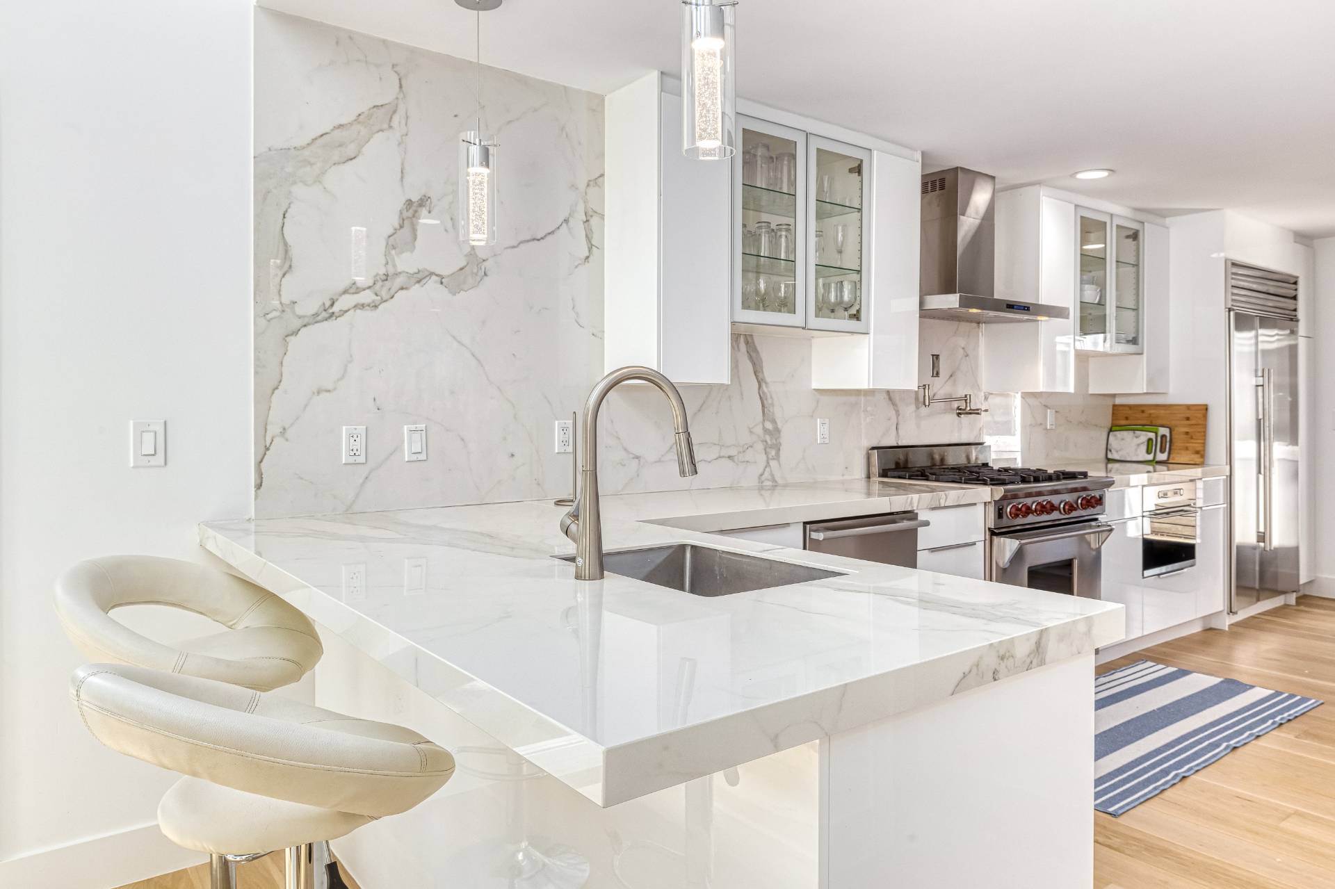 2 Jodys Path East Hampton, NY 11937 - Photo 23 of 43 a kitchen with stainless steel appliances a sink a stove and a refrigerator