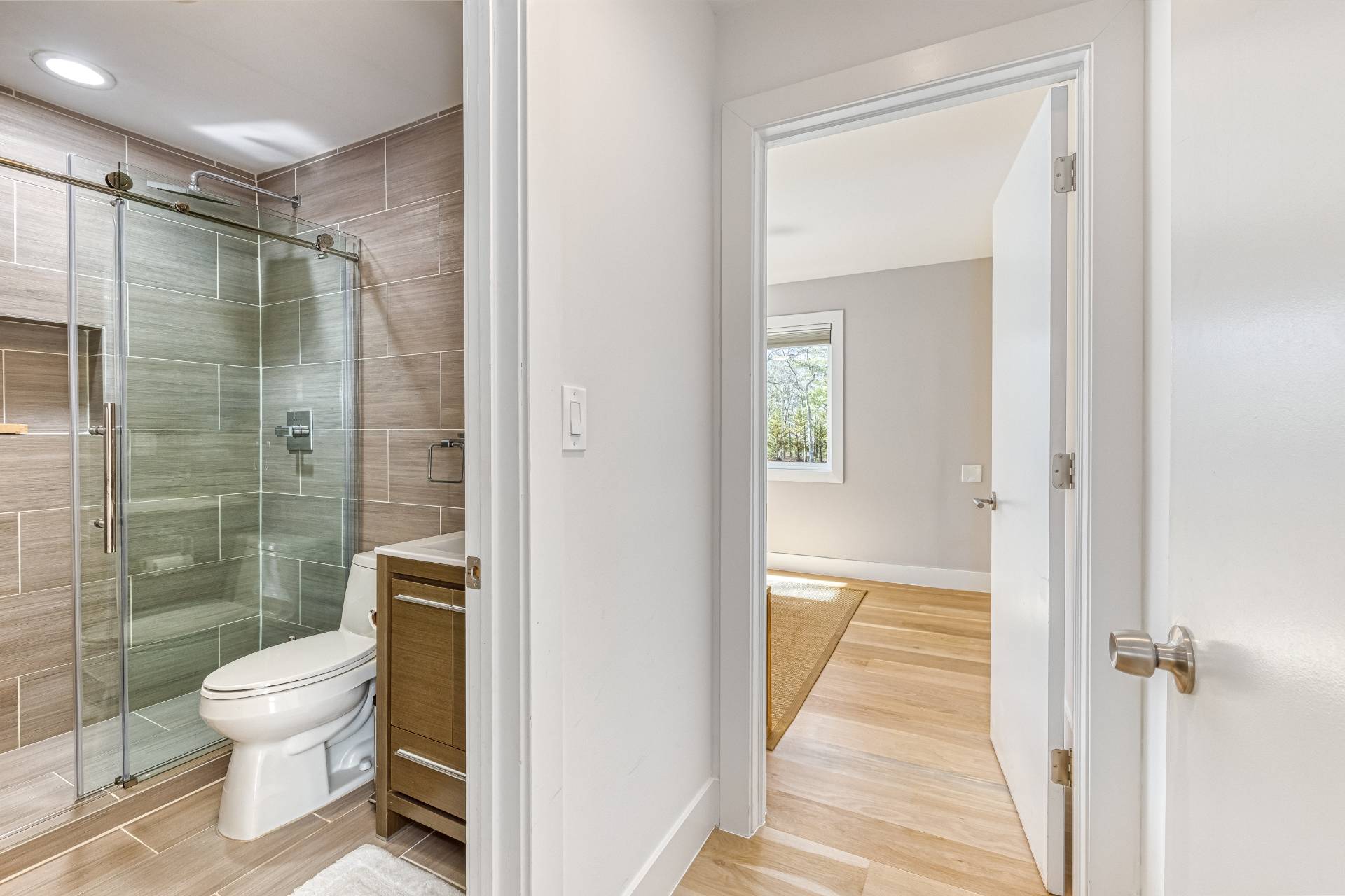 2 Jodys Path East Hampton, NY 11937 - Photo 26 of 43 a bathroom with a shower a toilet and a sink