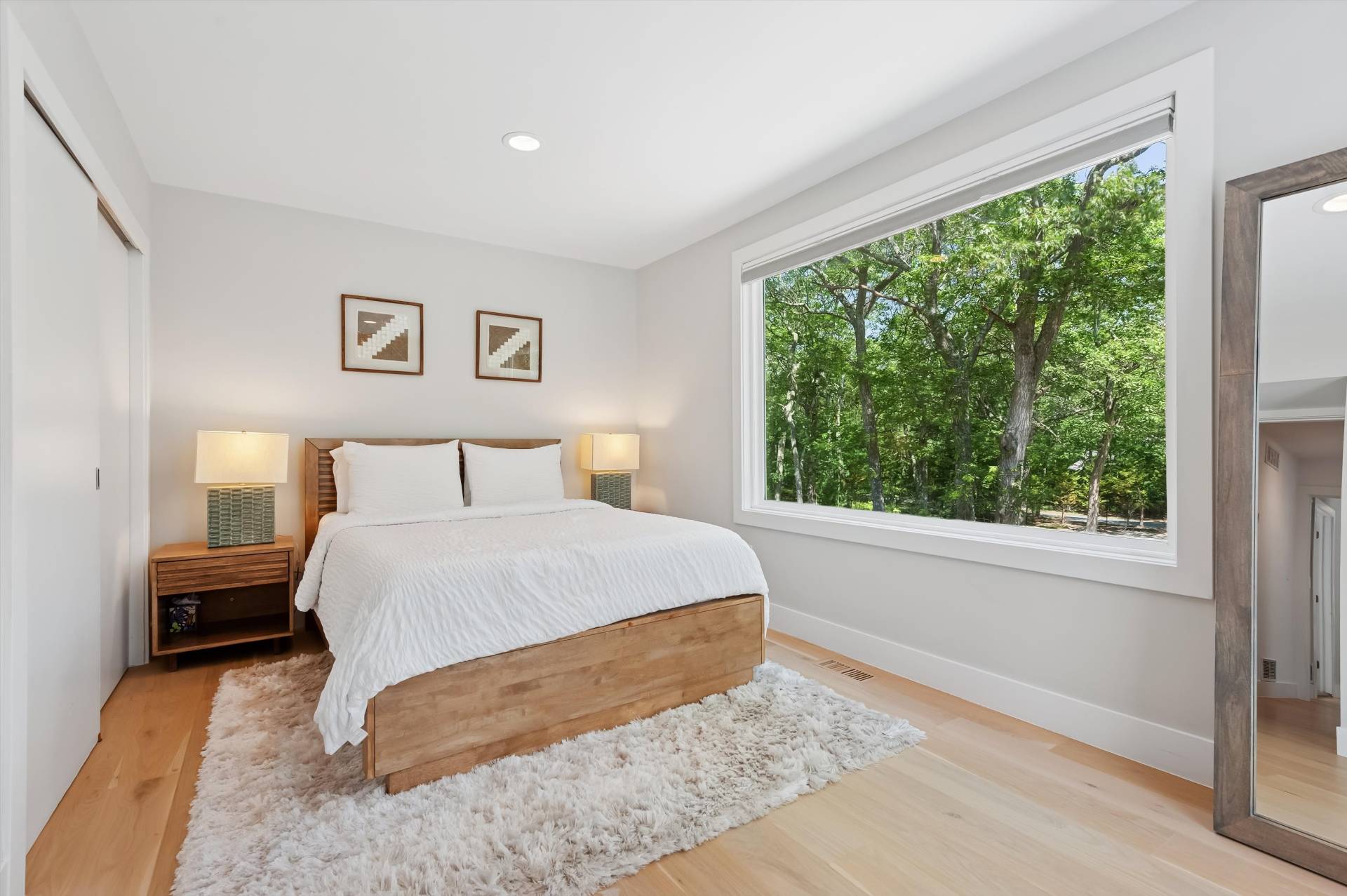 2 Jodys Path East Hampton, NY 11937 - Photo 31 of 43 a bedroom with a bed and a window