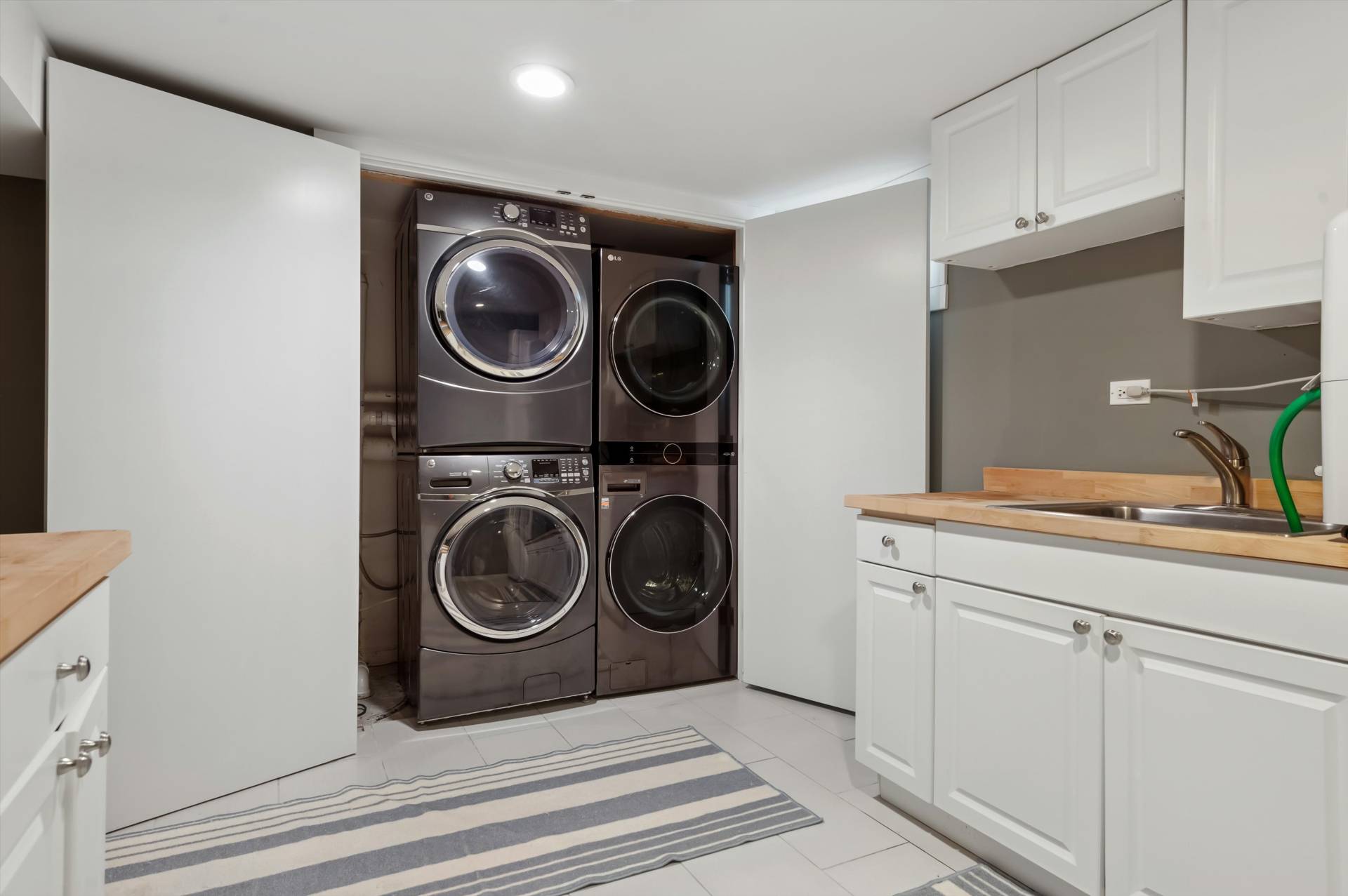 2 Jodys Path East Hampton, NY 11937 - Photo 36 of 43 a utility room with sink dryer and washer
