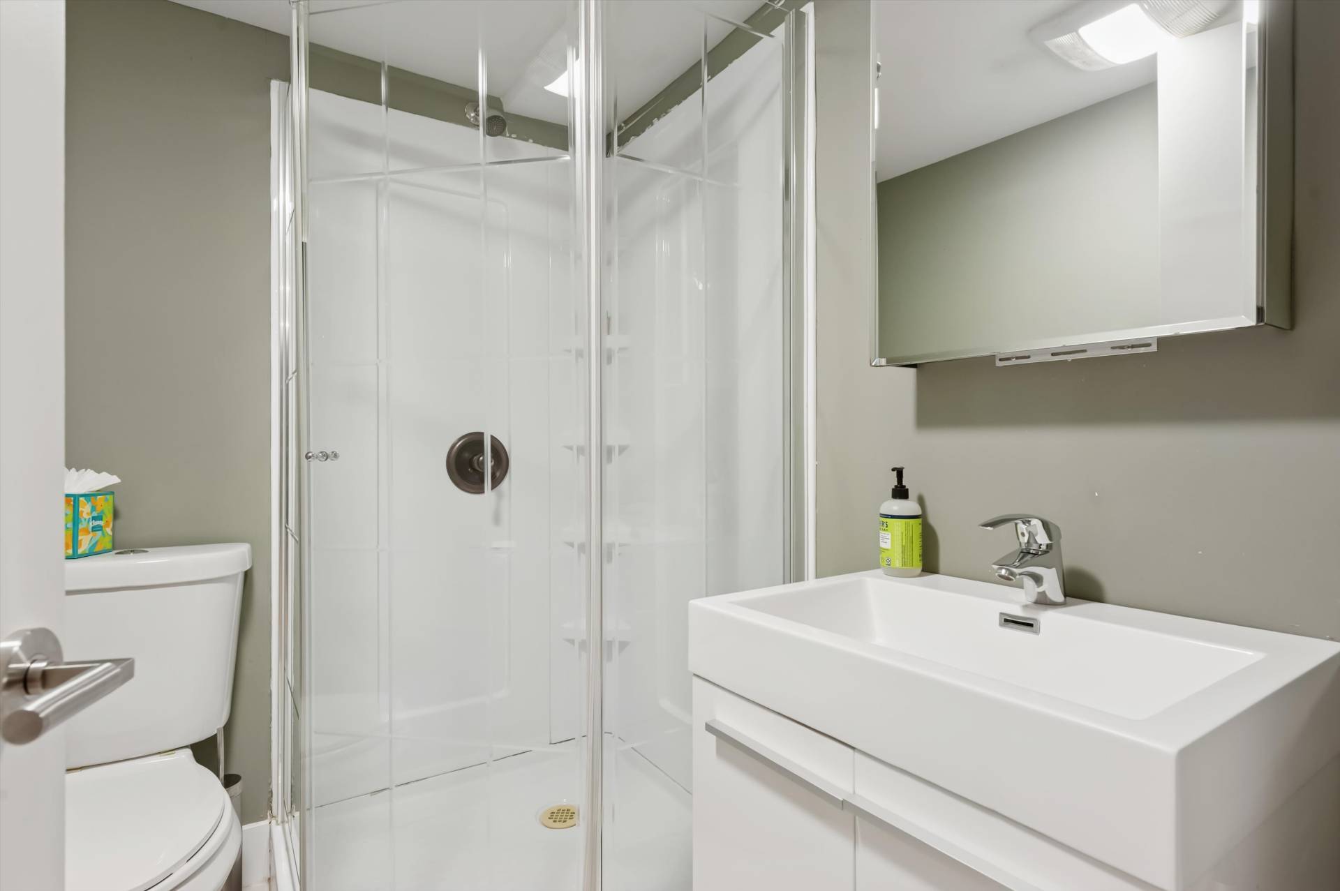2 Jodys Path East Hampton, NY 11937 - Photo 37 of 43 a bathroom with a sink a toilet and shower