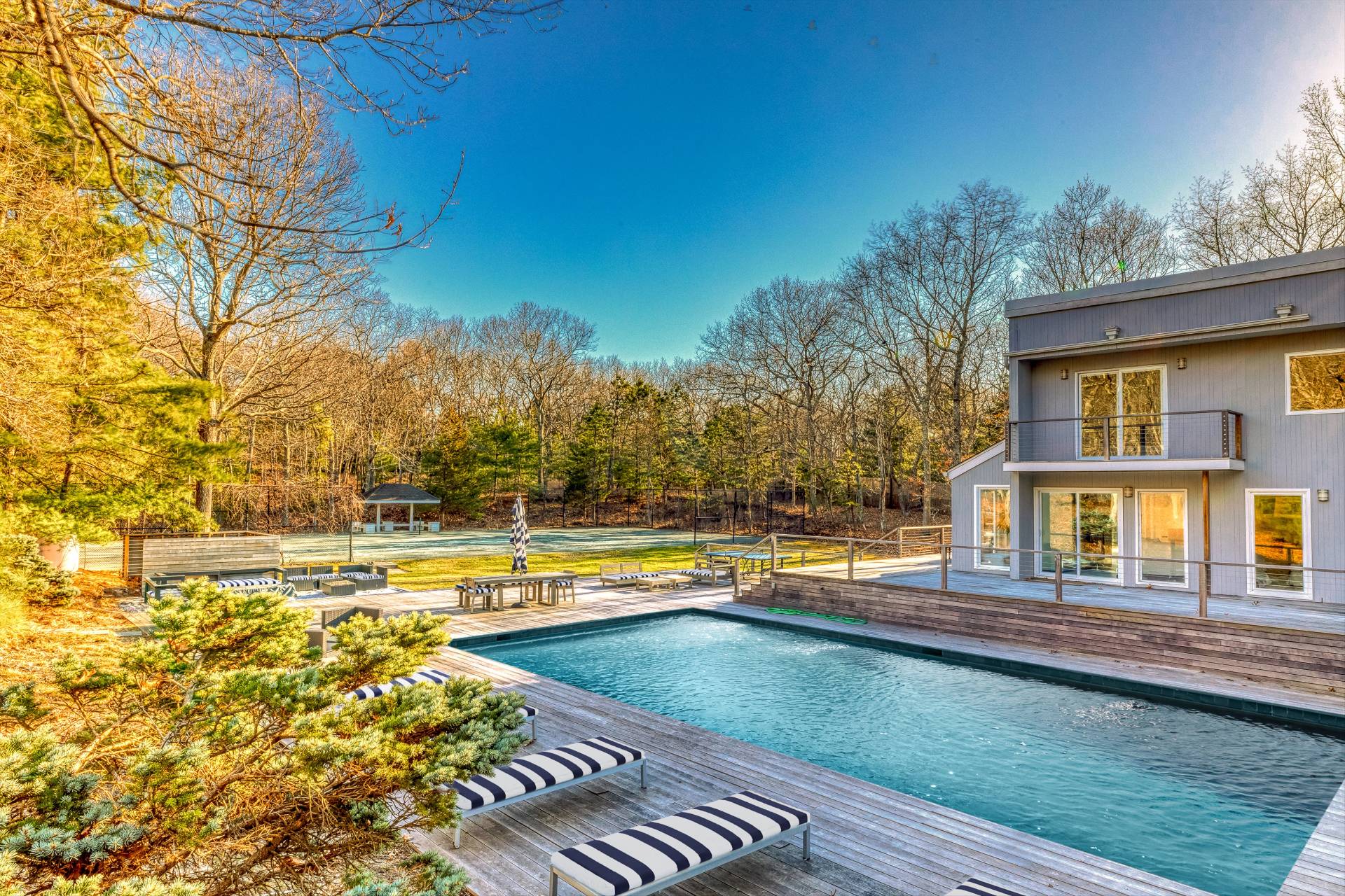 2 Jodys Path East Hampton, NY 11937 - Photo 43 of 43 a view of a swimming pool with an outdoor seating