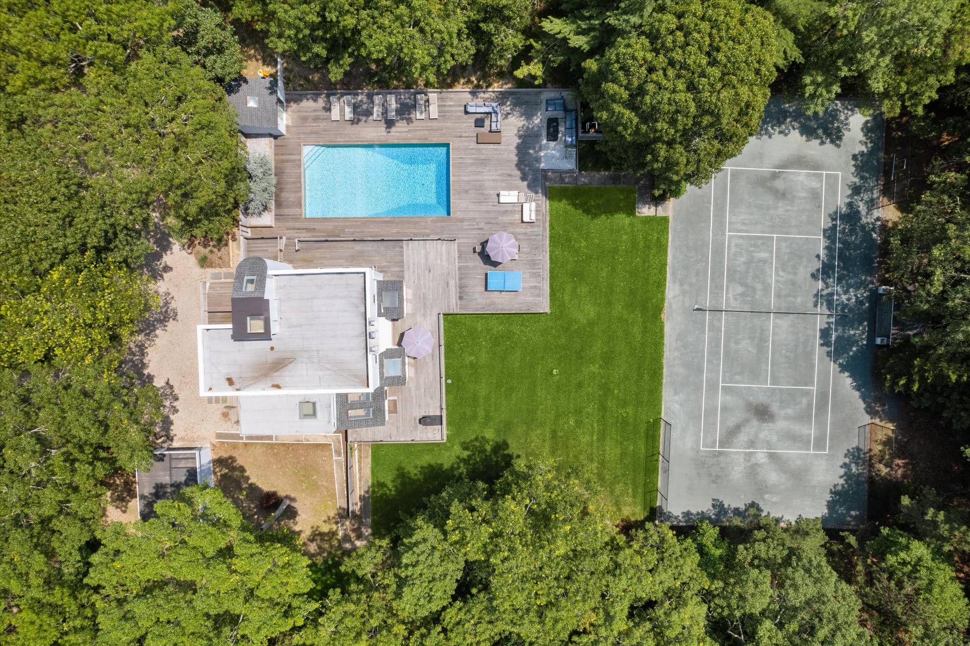 2 Jodys Path East Hampton, NY 11937 - Photo 10 of 43 an aerial view of a house with a garden