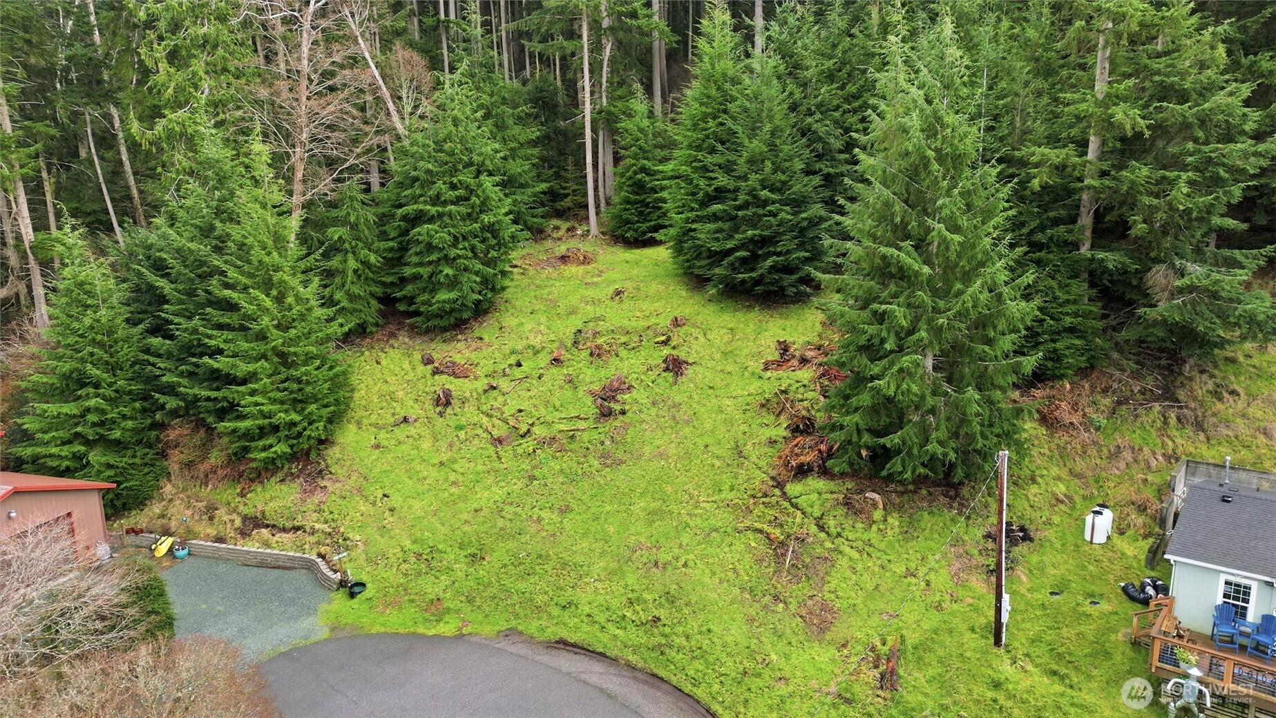 5184 Ridgeline Place Oak Harbor, WA 98277 - Photo 2 of 20 a view of a backyard of the house