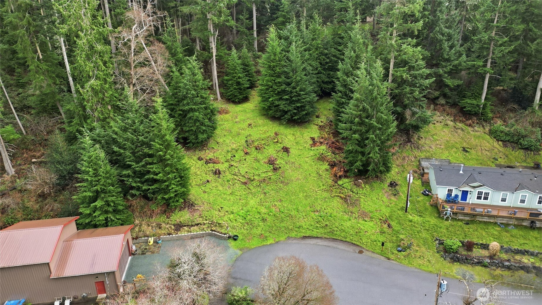 5184 Ridgeline Place Oak Harbor, WA 98277 - Photo 4 of 20 an aerial view of a house with a yard