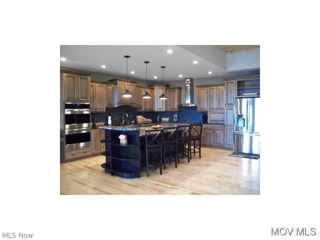 486 Woodlawn Ridge Road Washington, WV 26181 - Photo 8 of 24 Maple kitchen with island