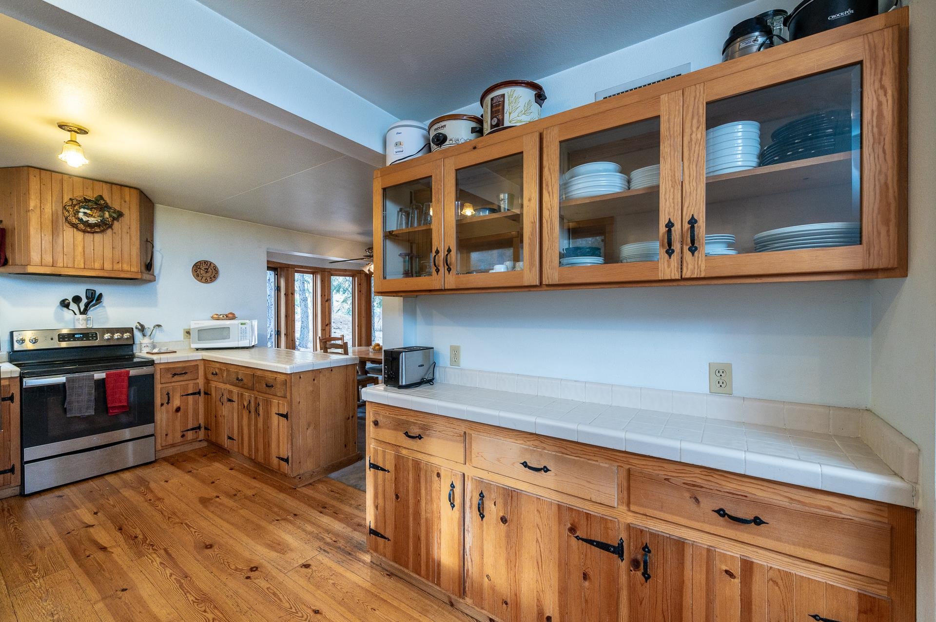 1191 Snow Crest Road Alpine Meadows, CA 96146 - Photo 4 of 21 a kitchen with stainless steel appliances granite countertop a stove and cabinets