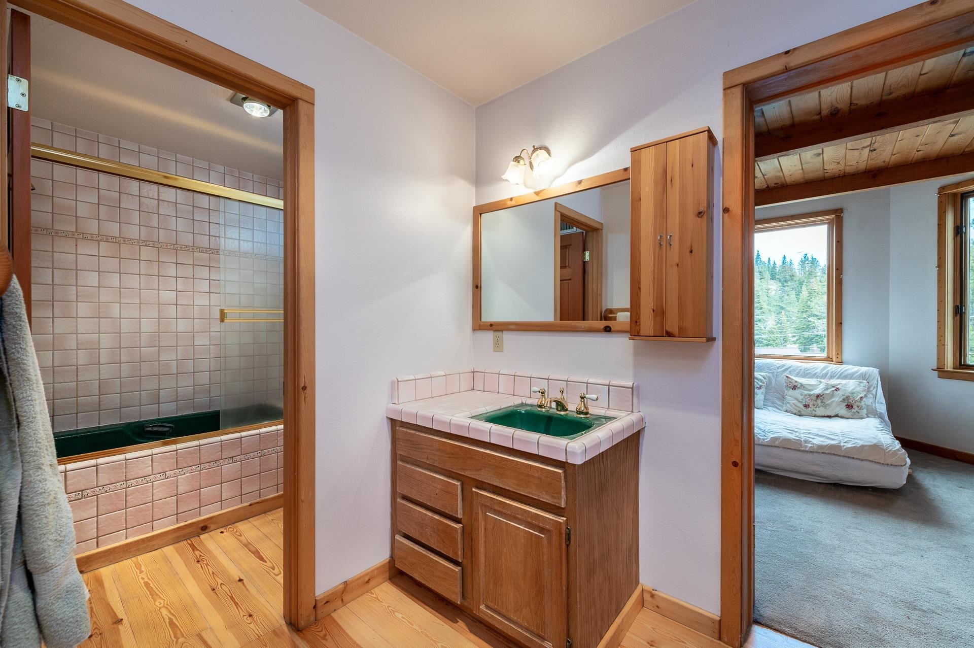 1191 Snow Crest Road Alpine Meadows, CA 96146 - Photo 10 of 21 a bathroom with a sink and a mirror