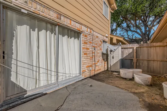a view of a back yard of the house