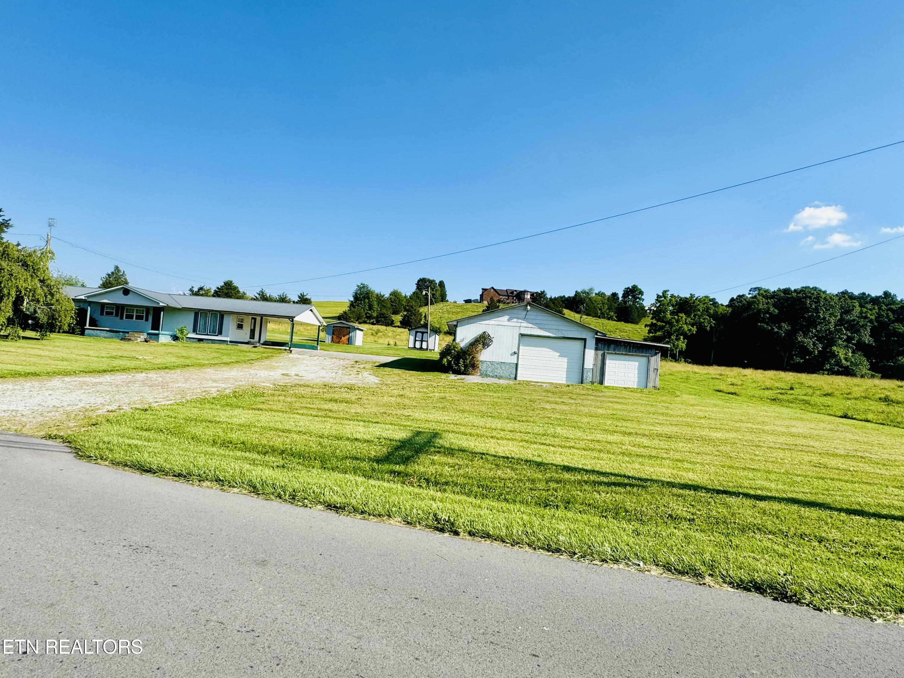 1400 Cave Springs Road Tazewell, TN 37879 - Photo 1 of 23 IMG_8734