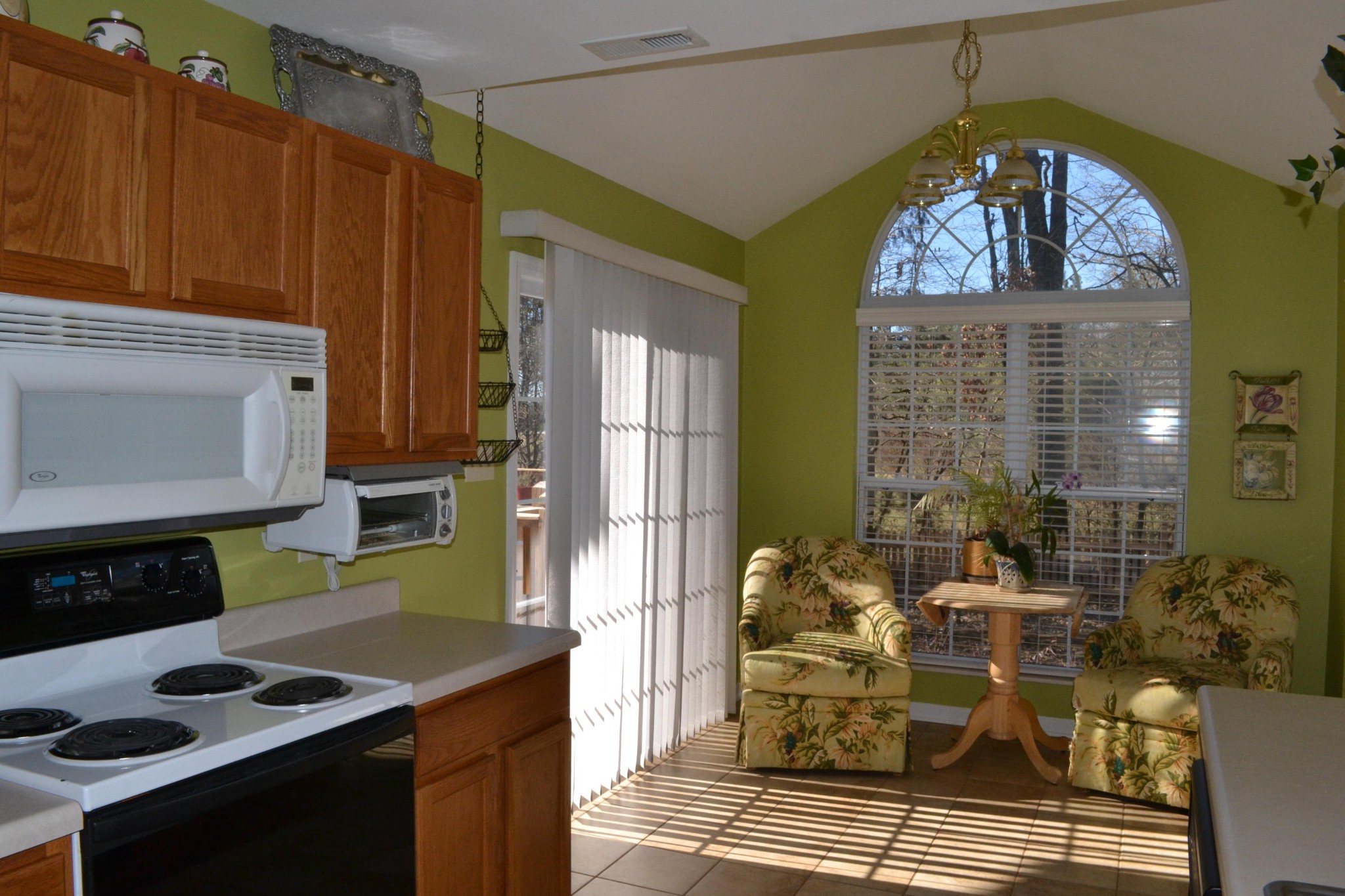 929 Station View Road Knoxville, TN 37919 - Photo 16 of 33 a kitchen with granite countertop a stove a sink and a cabinets