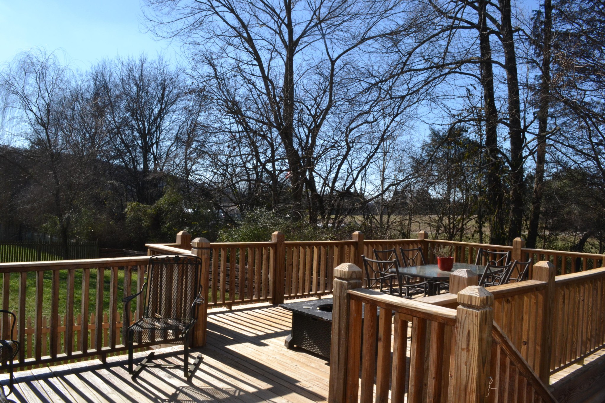 929 Station View Road Knoxville, TN 37919 - Photo 19 of 33 a view of balcony with wooden fence and trees