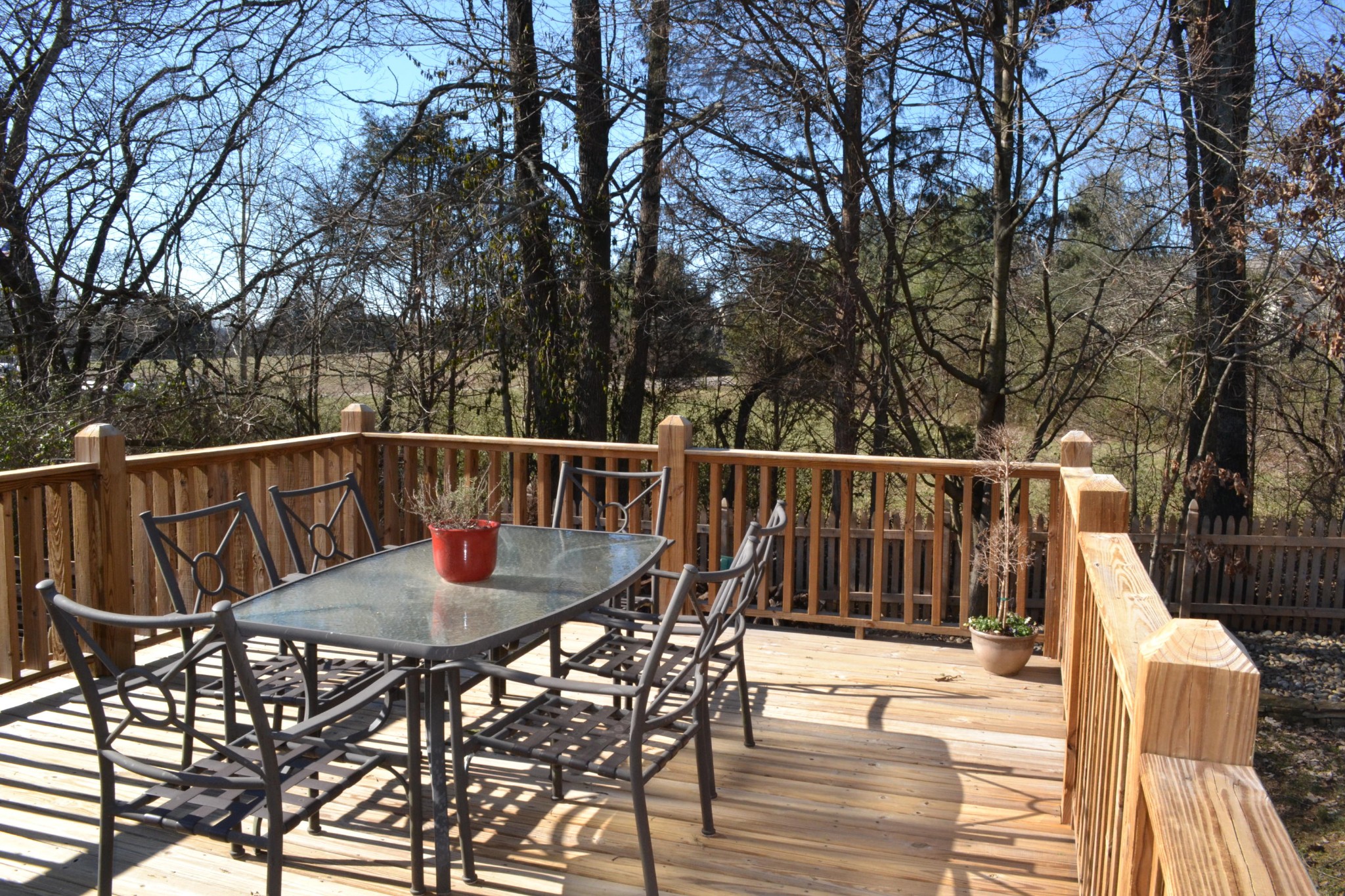 929 Station View Road Knoxville, TN 37919 - Photo 21 of 33 a view of a wooden chairs and table on the deck