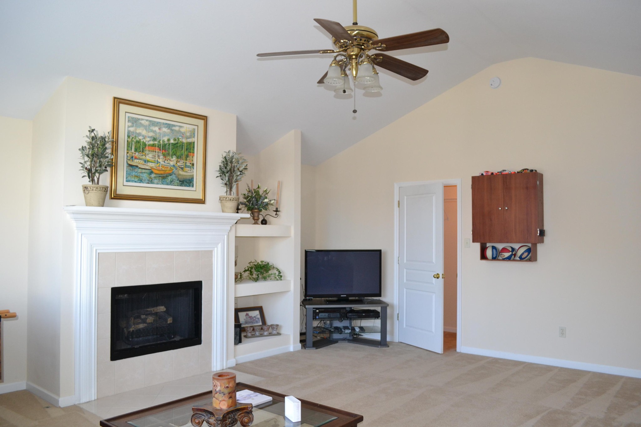 929 Station View Road Knoxville, TN 37919 - Photo 3 of 33 a living room with furniture a fireplace and a flat screen tv