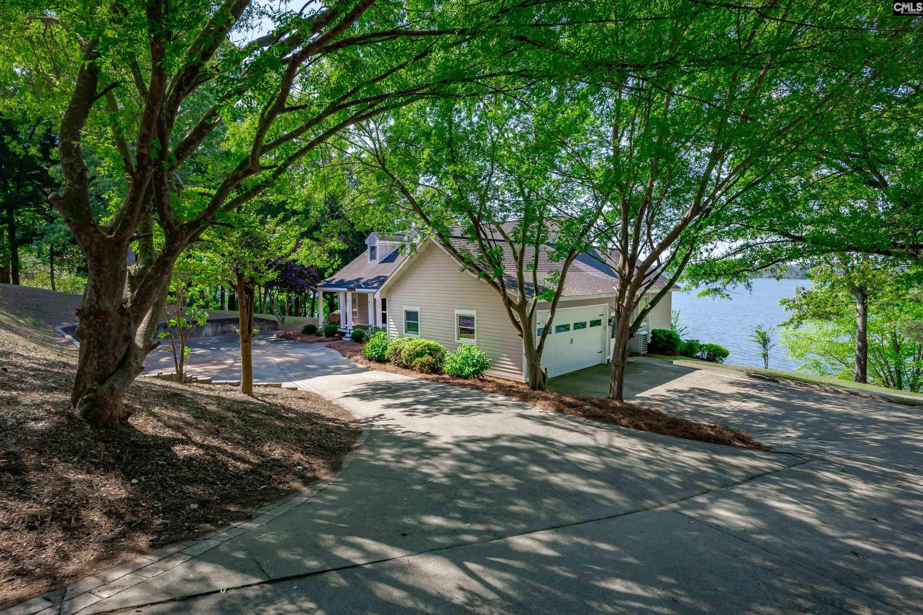 2577 Harbor View Road Camden, SC 29020 - Photo 5 of 42 a dirt road with trees in front of it