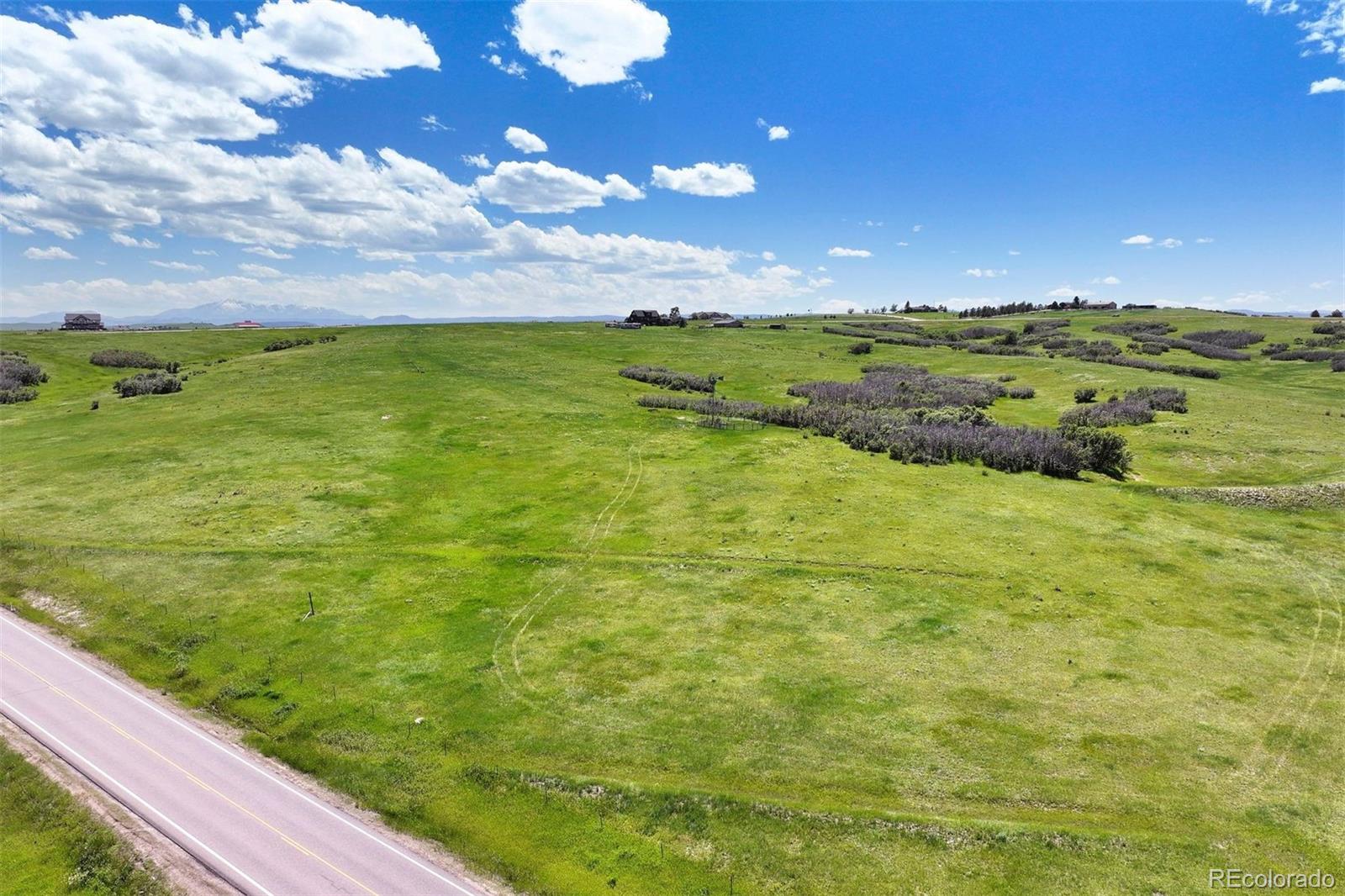 6410 Lake Gulch Road Franktown, CO 80116 - Photo 7 of 8 a view of an ocean from a yard