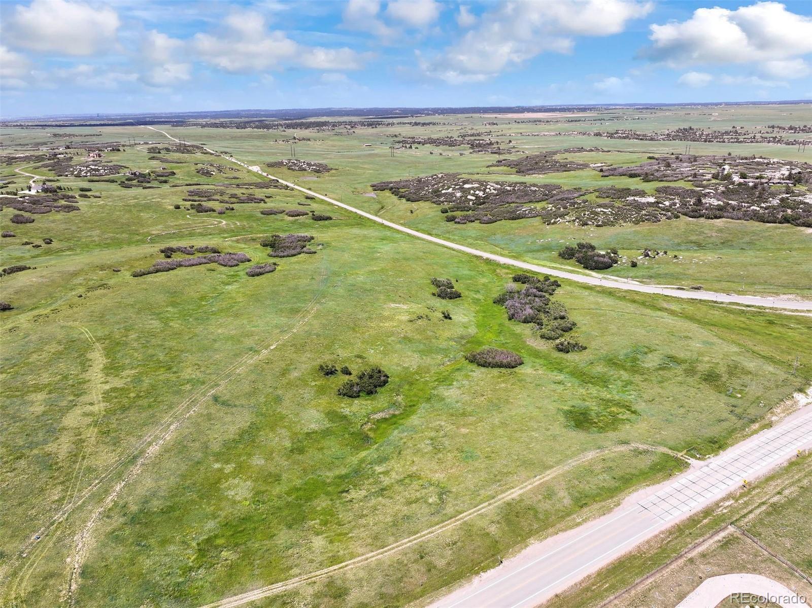 6410 Lake Gulch Road Franktown, CO 80116 - Photo 8 of 8 a view of an ocean and beach
