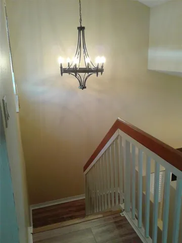 a view of a hallway with entryway