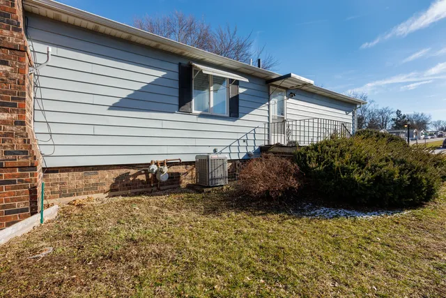 a view of a balcony with chairs