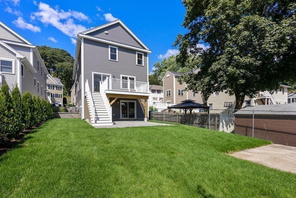 38 Gregory Street Waltham, MA 02451 - Photo 18 of 21 a house view with a garden space