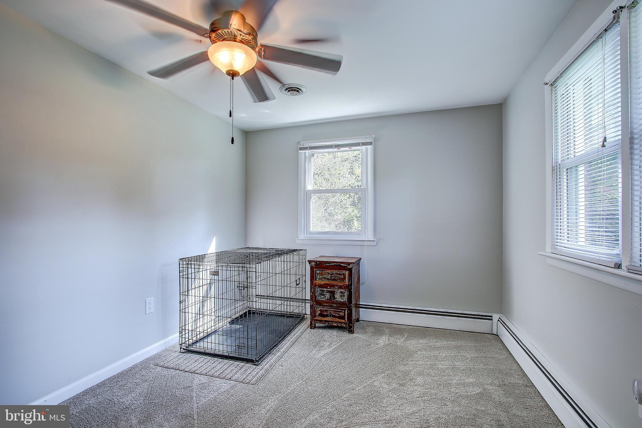 13846 Penn Shop Road Mount Airy, MD 21771 - Photo 21 of 42 a view of room with window and ceiling fan