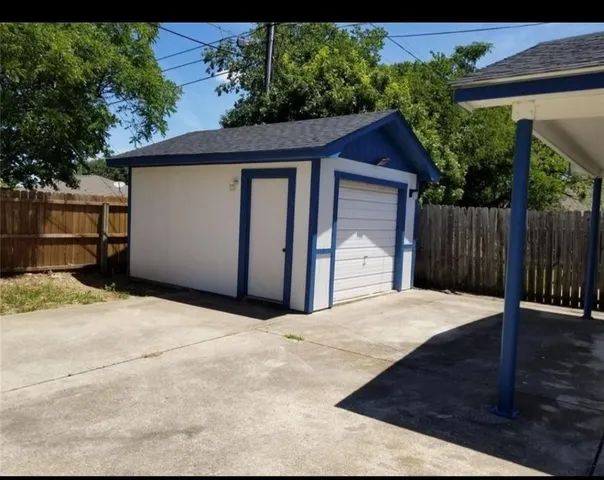 a wooden house with a outdoor space