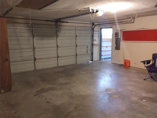 a kitchen with granite countertop a stove and a sink