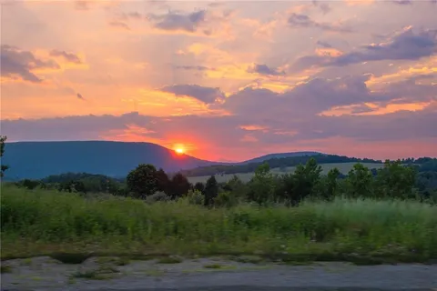 a view of a city and a mountain view