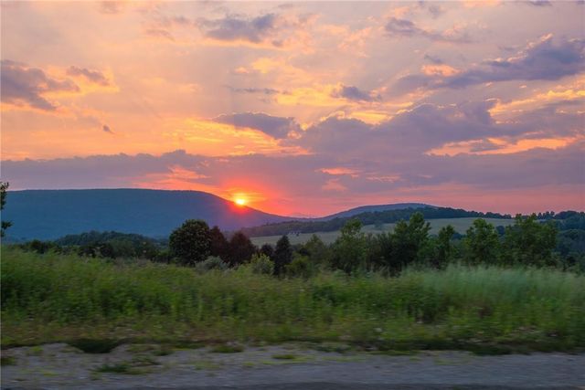 a view of a city and a mountain view