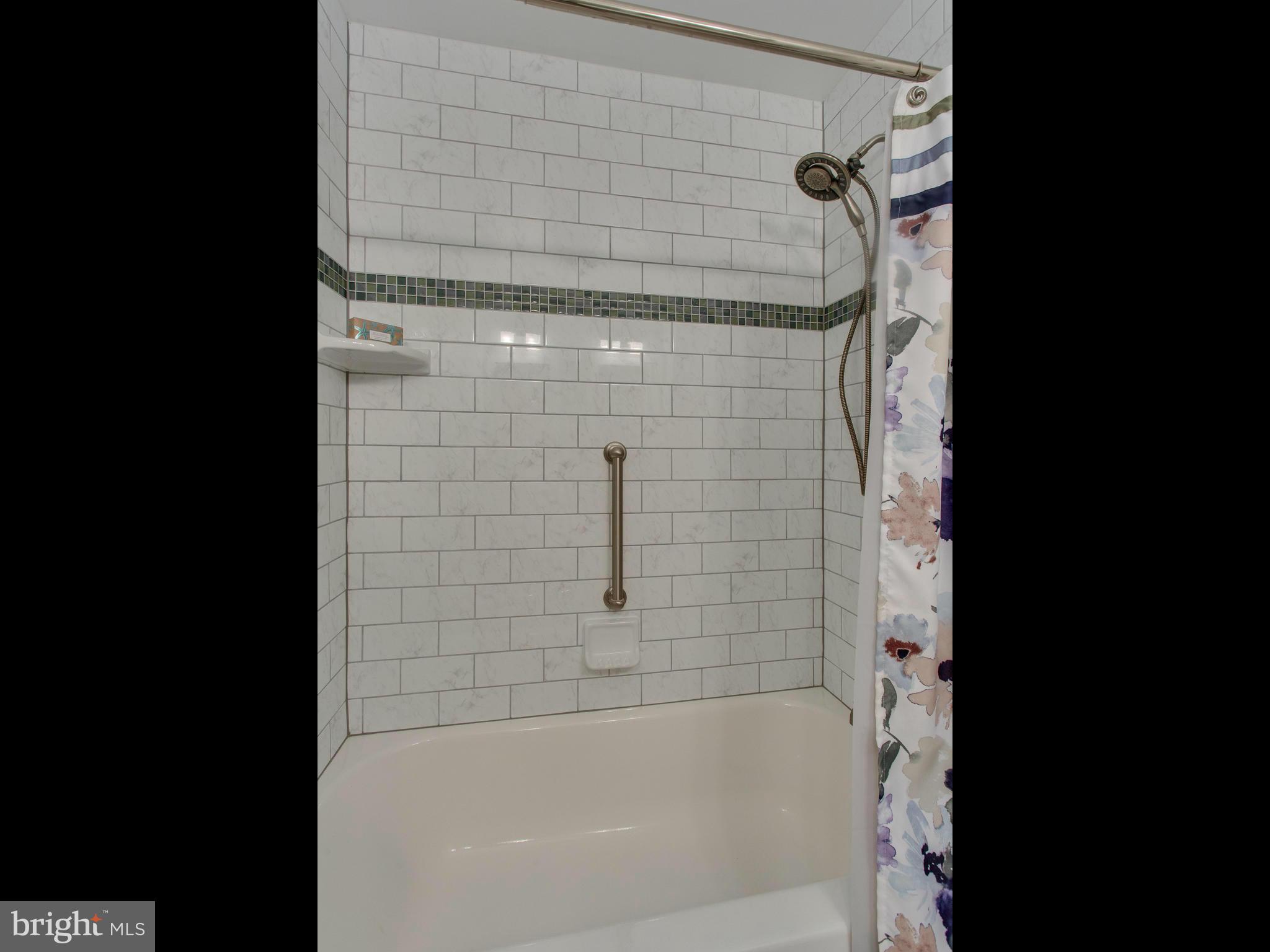 9304 Winbourne Road Burke, VA 22015 - Photo 19 of 30 Beautiful Tub Enclosure w/Stylish Tile Details