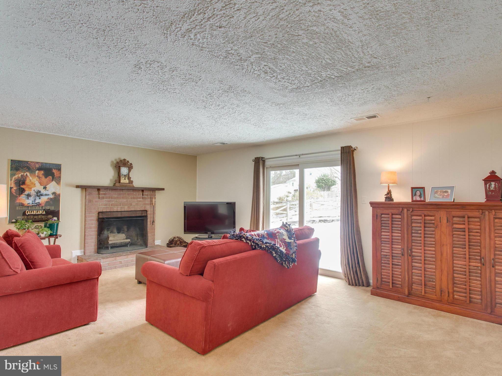 9304 Winbourne Road Burke, VA 22015 - Photo 22 of 30 Lower Level Rec Room w/Fireplace
