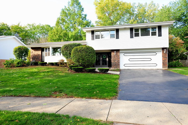 1826 Smith Road Northbrook, IL 60062 - Photo 1 of 22 a front view of a house with a yard