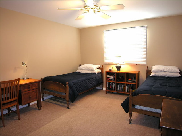 1826 Smith Road Northbrook, IL 60062 - Photo 14 of 22 a bedroom with a bed furniture and a window
