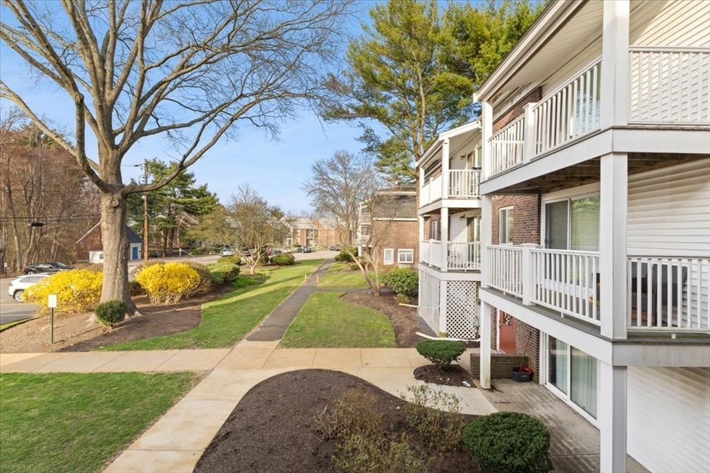39 Will Drive, Unit 16 Canton, MA 02021 - Photo 12 of 13 a view of a house with backyard and sitting area