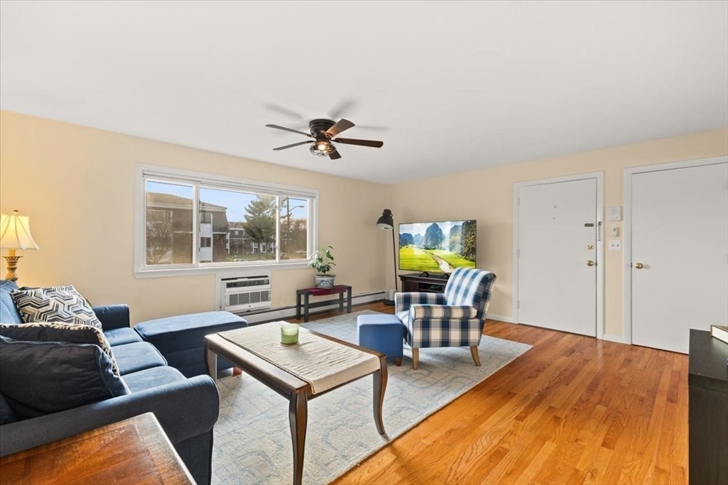 39 Will Drive, Unit 16 Canton, MA 02021 - Photo 4 of 13 a living room with furniture and a window