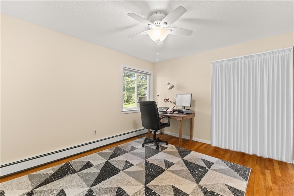 39 Will Drive, Unit 16 Canton, MA 02021 - Photo 7 of 13 a workspace with furniture and a window