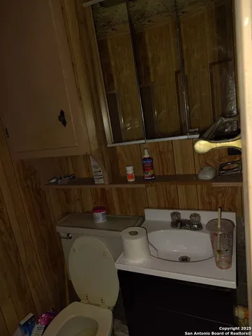 a view of a wooden door with a wooden door