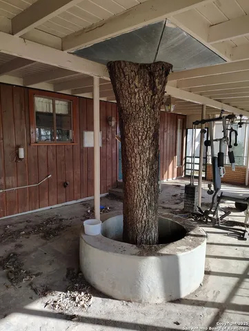 a front view of a house with a large window
