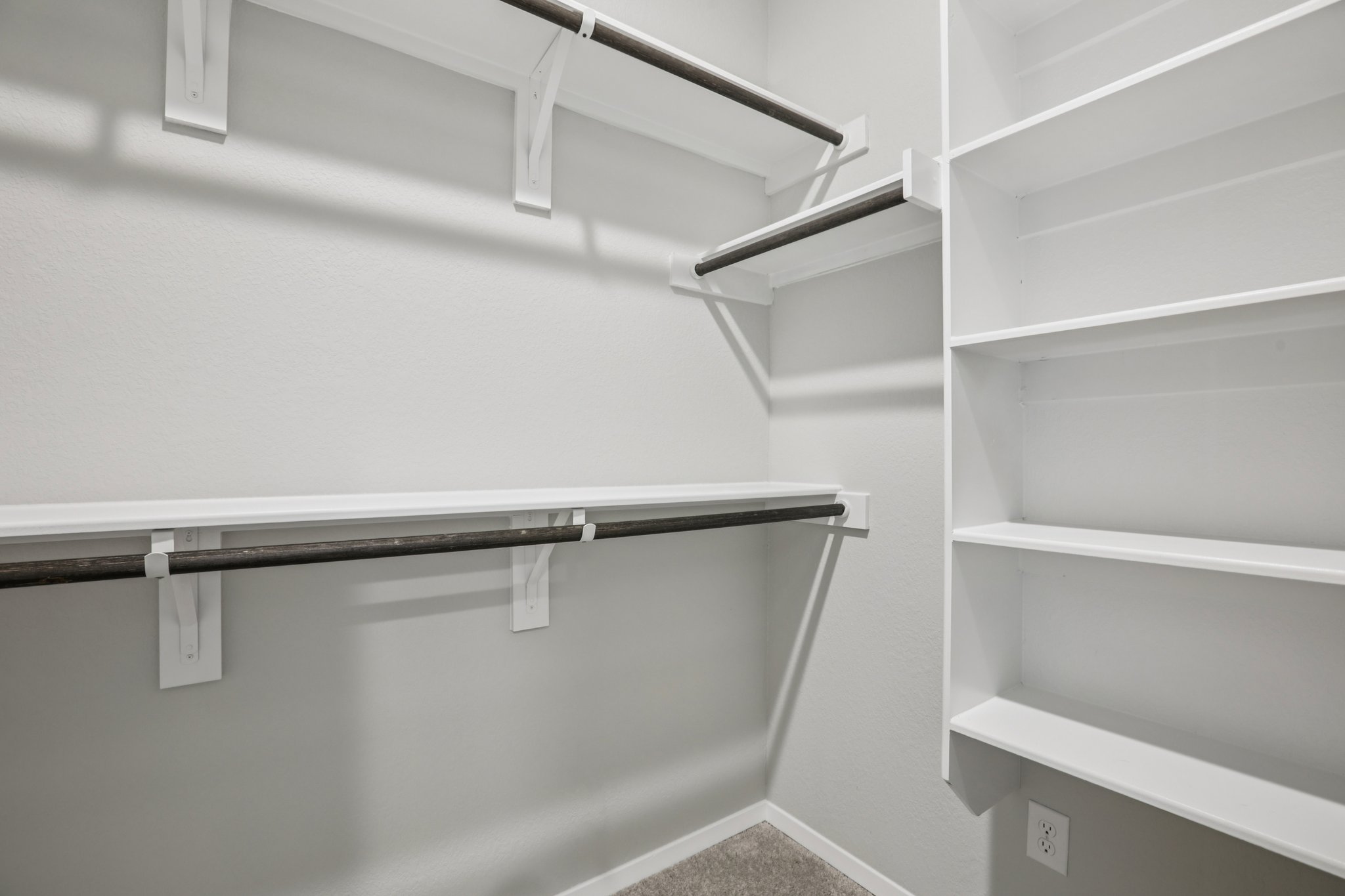 104 Summer Drive Elgin, TX 78621 - Photo 23 of 40 a view of an empty walk in closet
