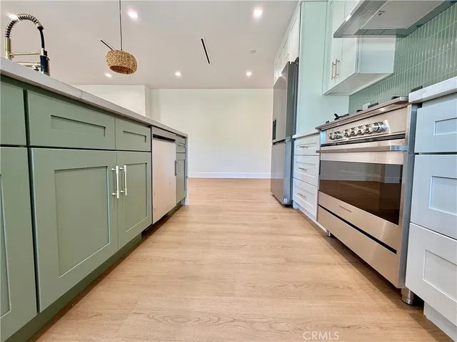 a view of hallway with washer and dryer