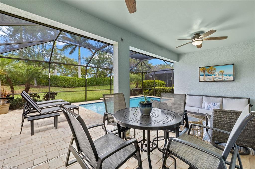 14671 Topsail Drive Naples, FL 34114 - Photo 23 of 36 a view of a dining room with furniture window and outside view