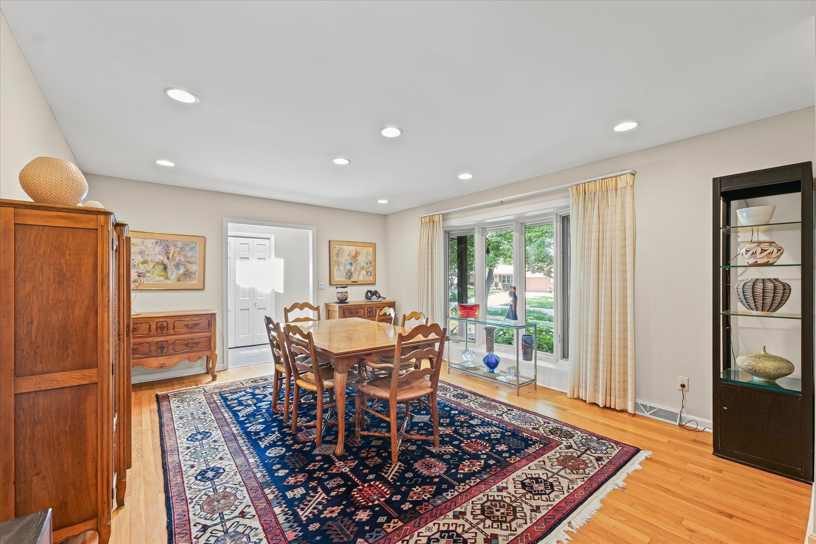 2119 Galen Drive Champaign, IL 61821 - Photo 11 of 39 a dining room with furniture and wooden floor