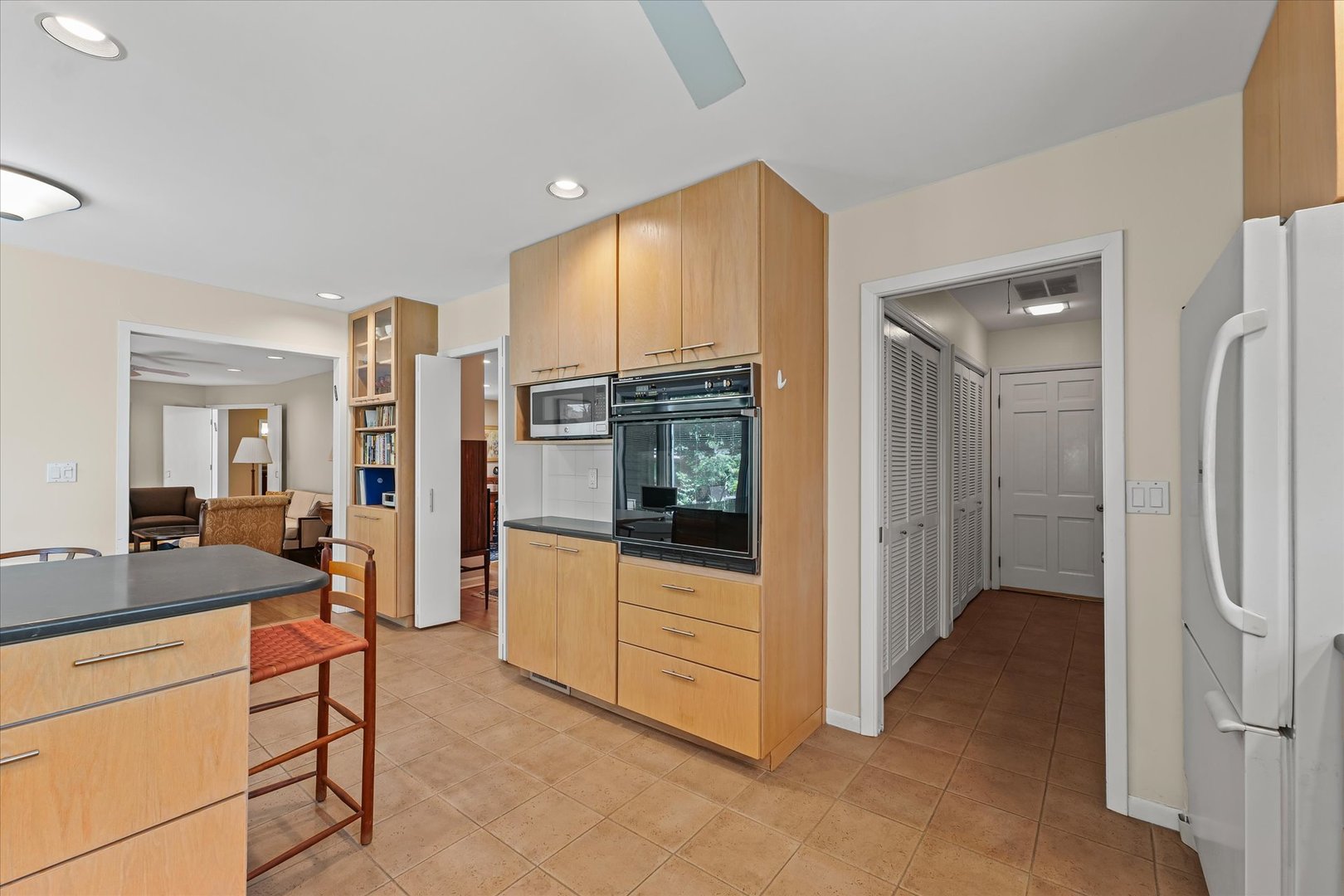 2119 Galen Drive Champaign, IL 61821 - Photo 15 of 39 a view of kitchen with stainless steel appliances granite countertop a refrigerator and cabinets