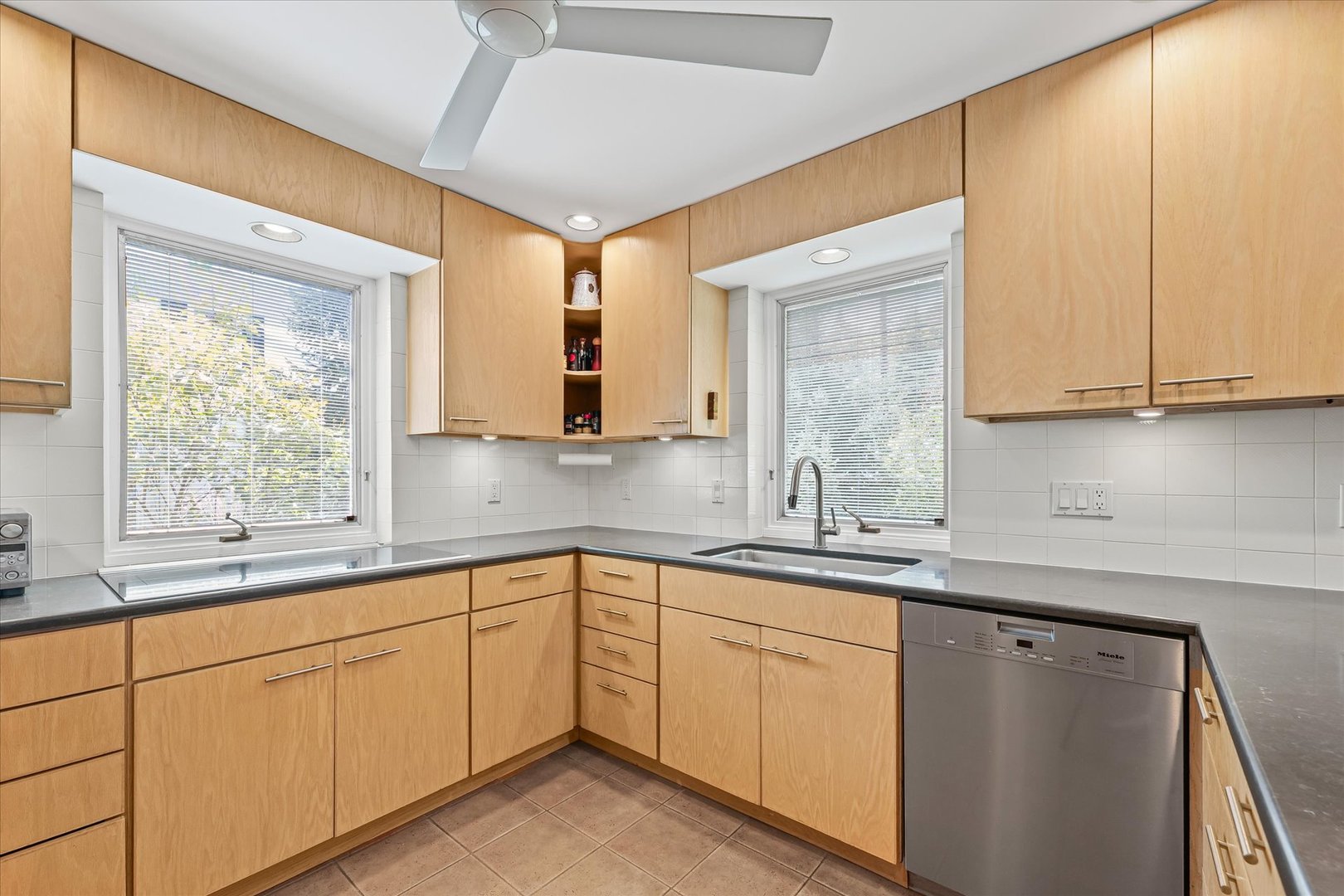 2119 Galen Drive Champaign, IL 61821 - Photo 17 of 39 a kitchen with a sink cabinets and window