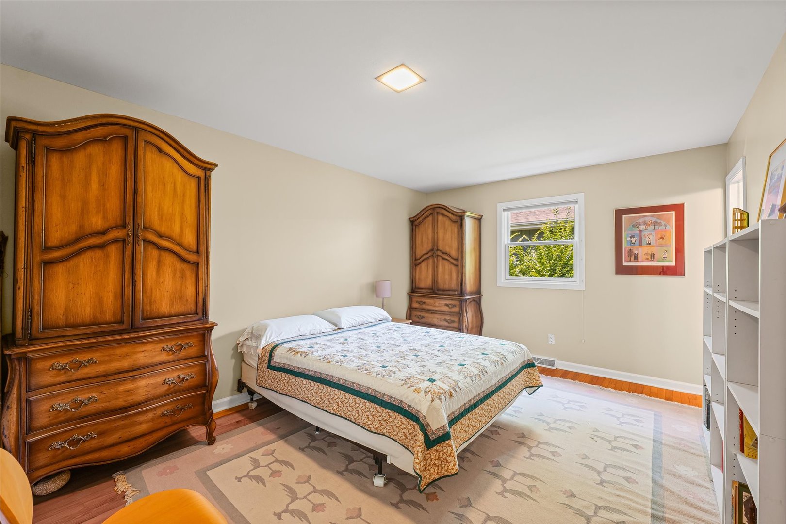 2119 Galen Drive Champaign, IL 61821 - Photo 23 of 39 a bedroom with a bed and wooden floor