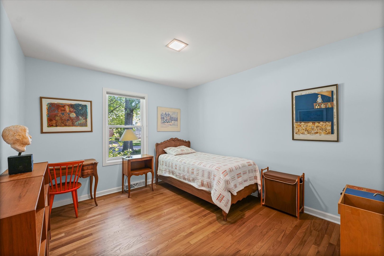 2119 Galen Drive Champaign, IL 61821 - Photo 26 of 39 a bedroom with a bed and wooden floor