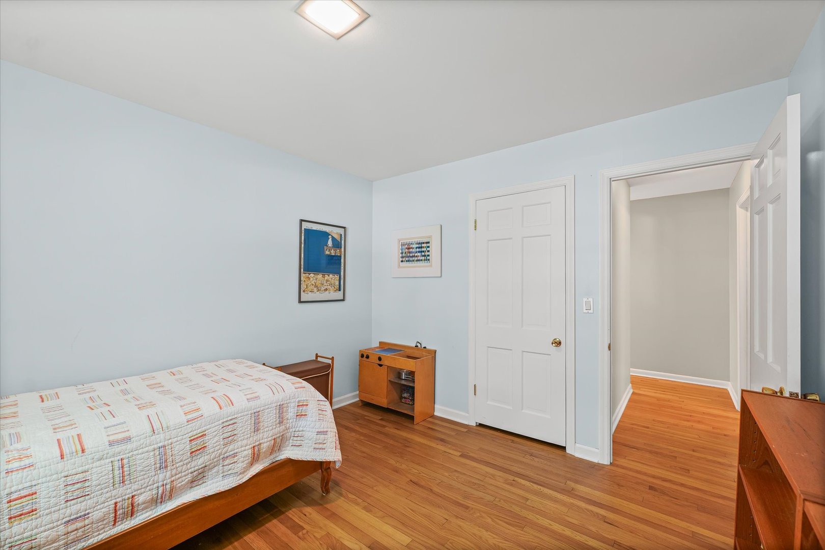 2119 Galen Drive Champaign, IL 61821 - Photo 27 of 39 a bedroom with a bed and wooden floor