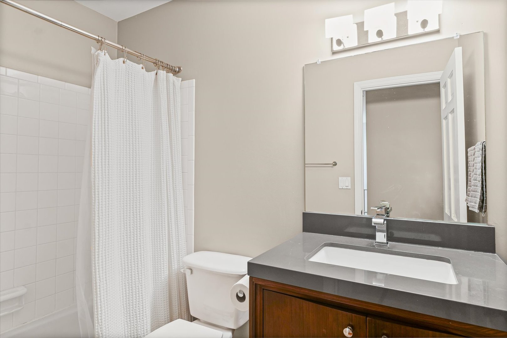 2119 Galen Drive Champaign, IL 61821 - Photo 30 of 39 a bathroom with a sink a toilet and a mirror