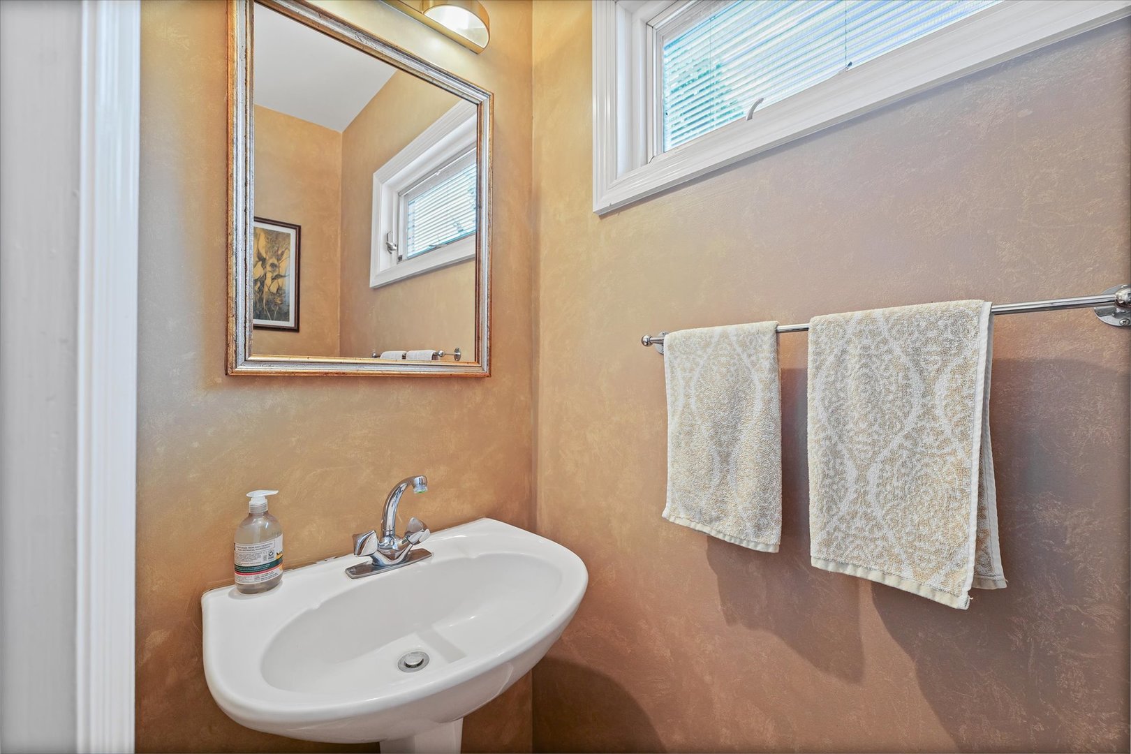 2119 Galen Drive Champaign, IL 61821 - Photo 32 of 39 a bathroom with a sink and mirror