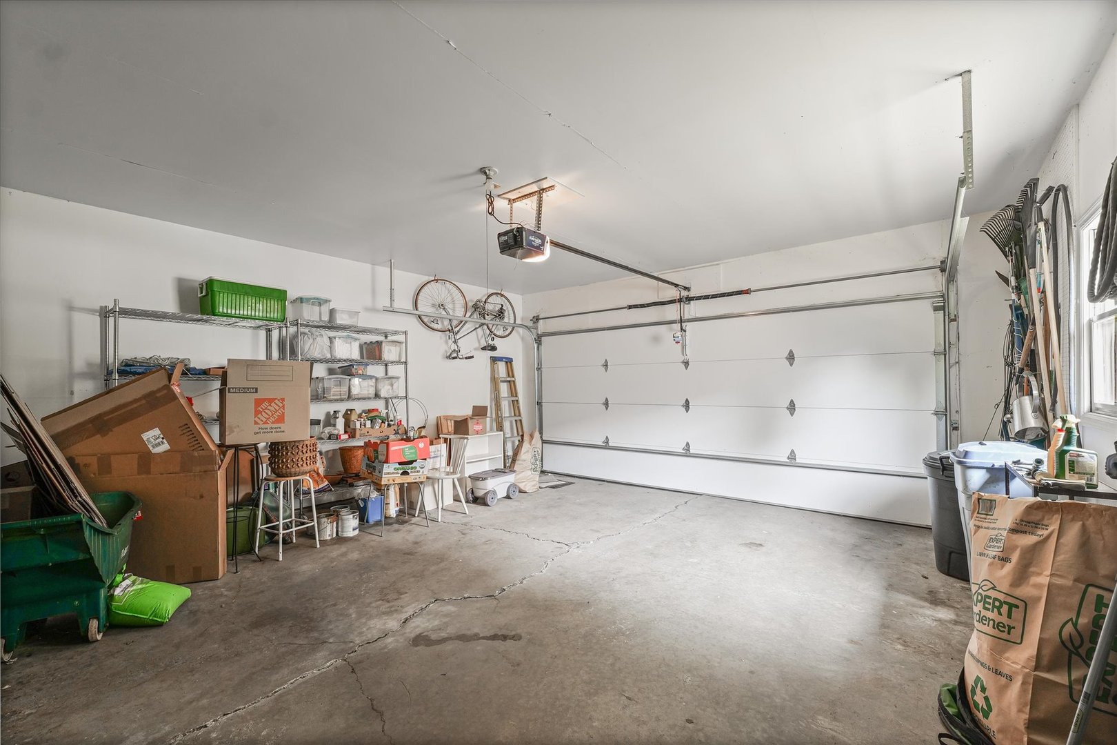 2119 Galen Drive Champaign, IL 61821 - Photo 34 of 39 a view of a garage with rack